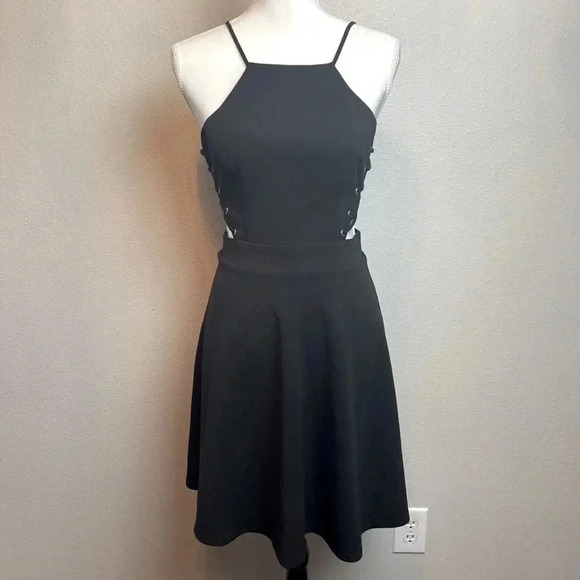 Dress with lace up detail on sides. Zipper in back. - Picture 2 of 12